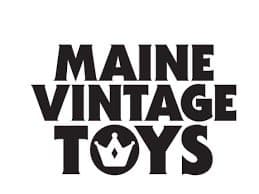 Text displays "MAINE VINTAGE TOYS" in bold, black font, with a crown graphic above the word "TOYS." The background is plain, emphasizing the text and graphic.